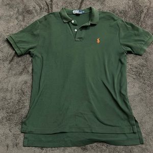 Men’s dark green Ralph Lauren Polo collared short sleeve top.
